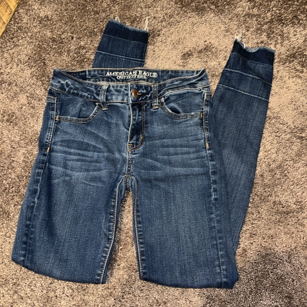 American Eagle distressed jegging raw hem fold up bottom jeans